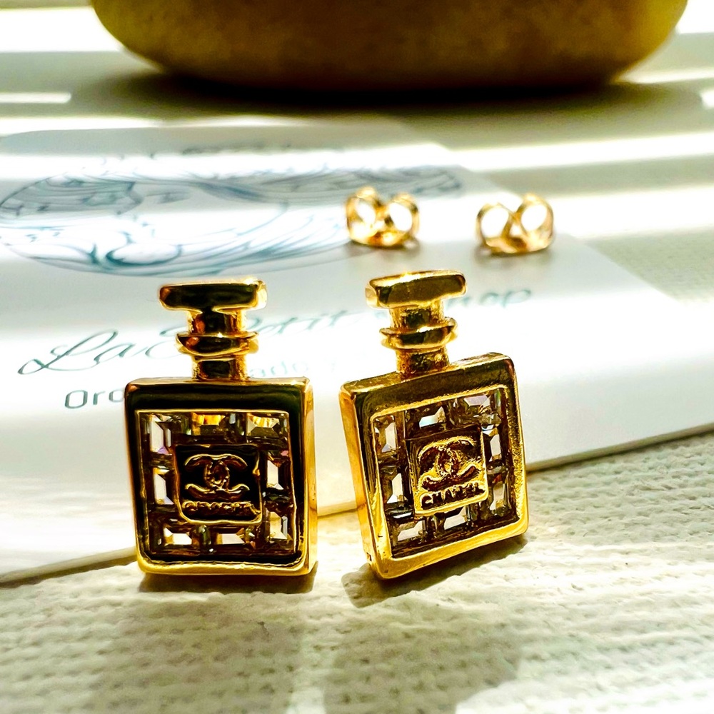 Inspiration perfume bottle earrings in 14k Laminated Gold.